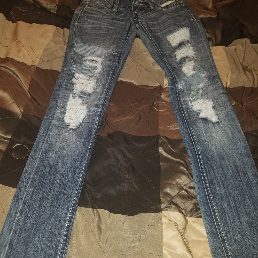 Almosy Famous Skinny Leg Worn Jeans